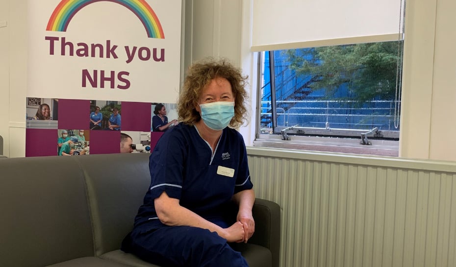 NHS Lothian staff member sitting in one of the wellbeing spaces