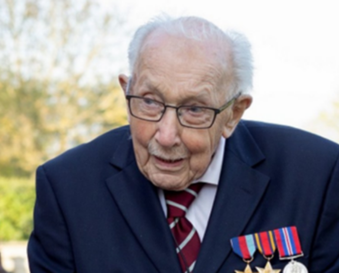 Close up of Captain Tom wearing his medals