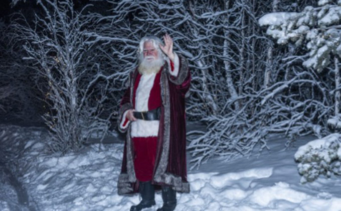 Santa in Lapland at Christmas during the FACE annual trip to support families impacted by cancer