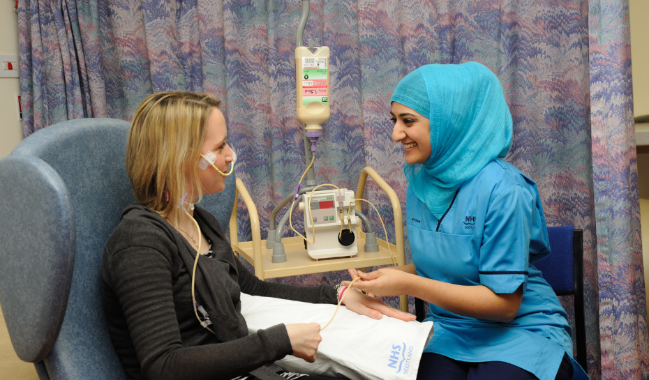 nurse talking to a patient in hospital