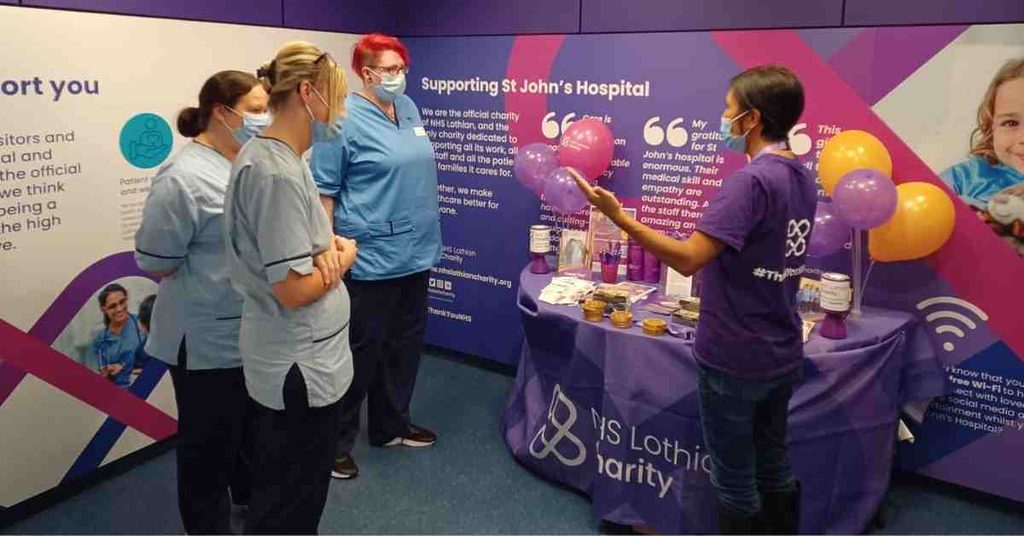 NHS Lothian Charity team talking to NHS Lothian Staff at St John's Hospital