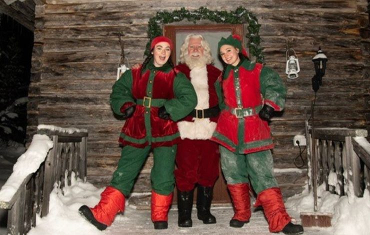 Santa and his elves during the annual FACE visit to Lapland at Christmas to support families who have been impacted by cancer