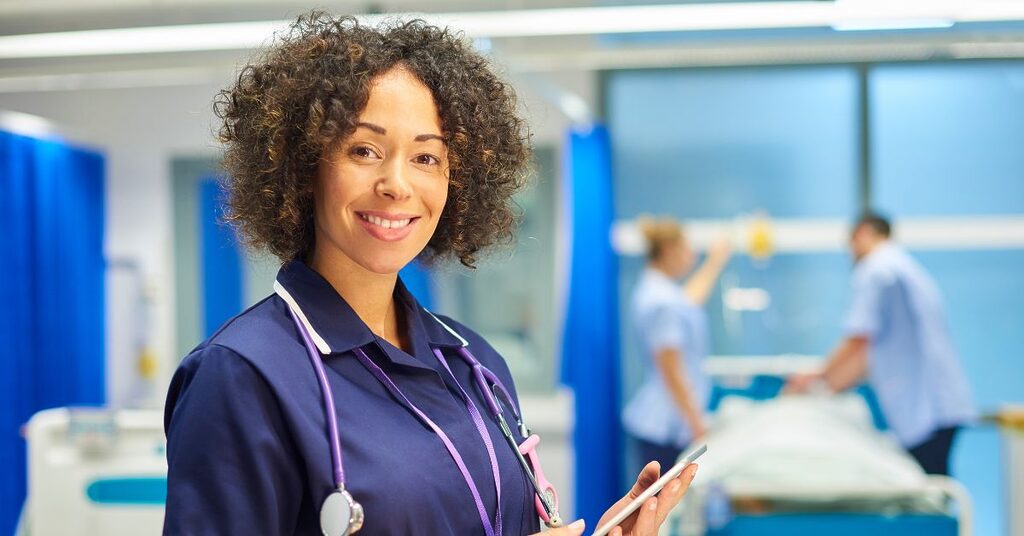 nurse facing the camera