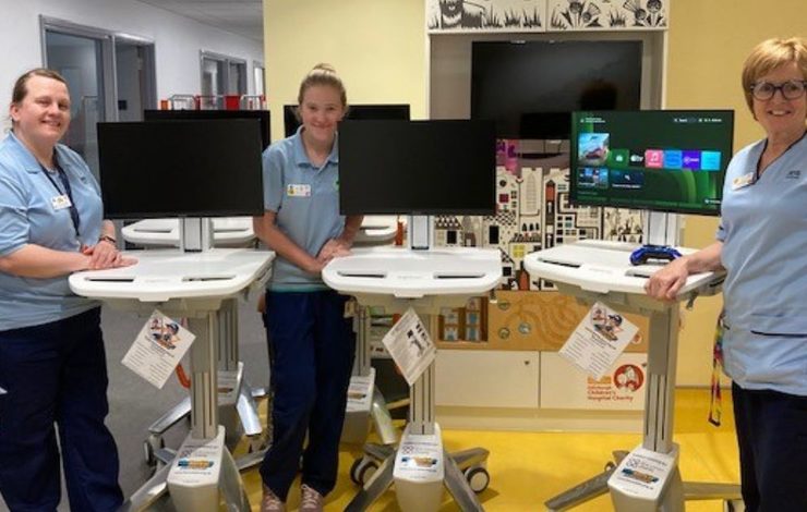 Play Specialists at the Royal Hospital for Children and Young People with Gaming Carts for patients