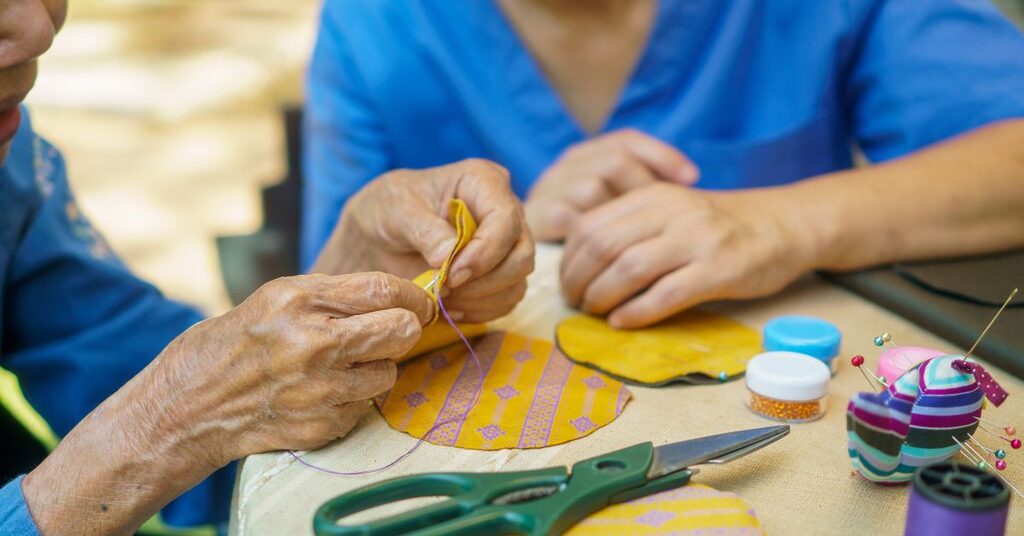 elderly patients doing crafts linked to Lynne and Lynsay's story