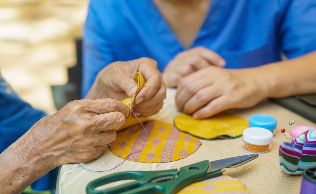 elderly patients doing crafts linked to Lynne and Lynsay's story