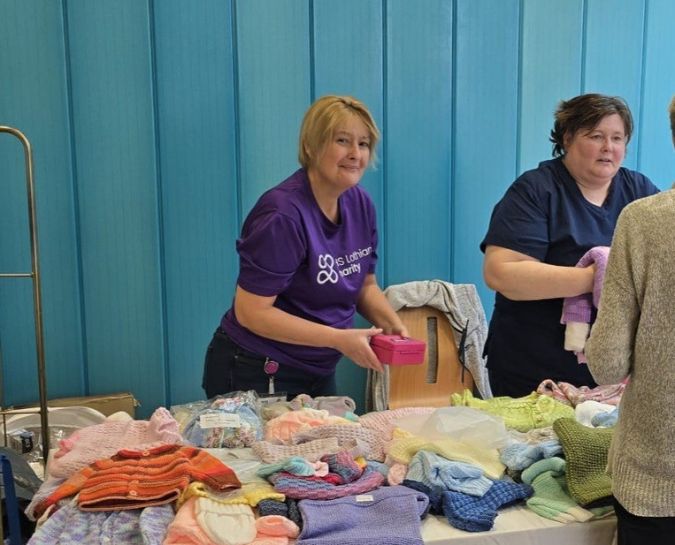 Gill Shaw and her colleague staffing a stand at the RIE