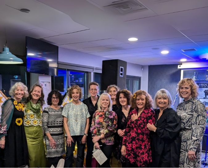 the sunflower and sunshine ladies at their fundraising gig