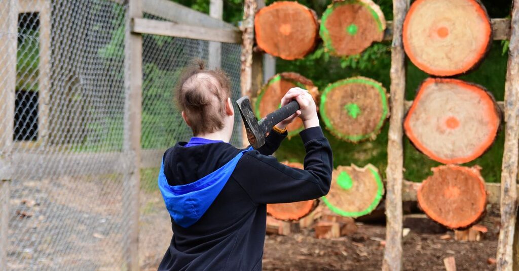 Axe throwing - Peer support weekend with Teenage Cancer Trust at Crieff Hydro