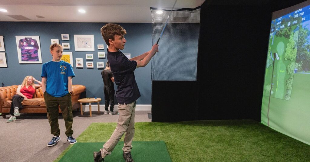 Interactive indoor golf - Peer support weekend with Teenage Cancer Trust at Crieff Hydro