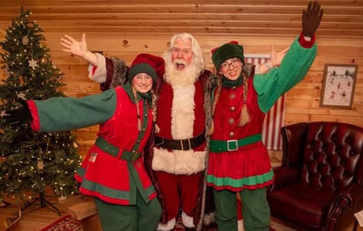 santa and his helpers at the FACE trip to lapland