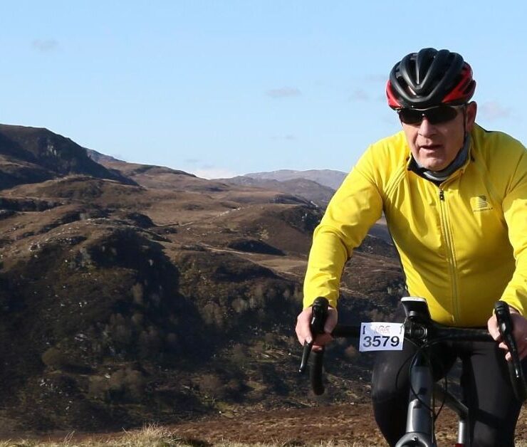 John Faulds, a community fundraiser, taking part in a cycling challenge to thank staff who care for his daughter, Natalie.