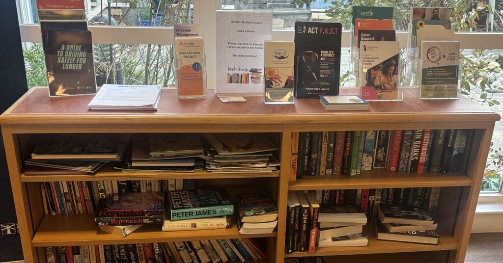 Book swap area in the waiting area at Dunbar Medical Practice