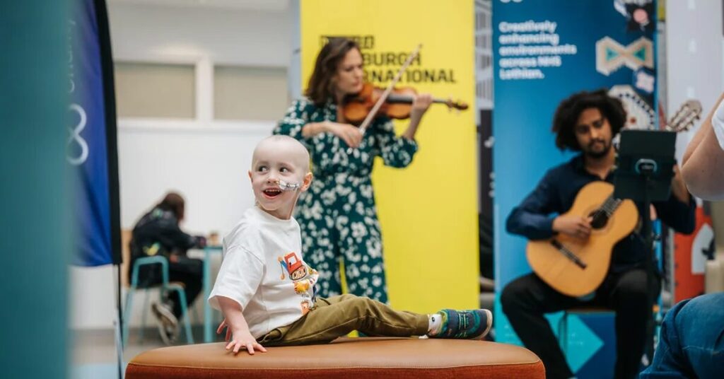 Nicola Benedetti With Child playing violin