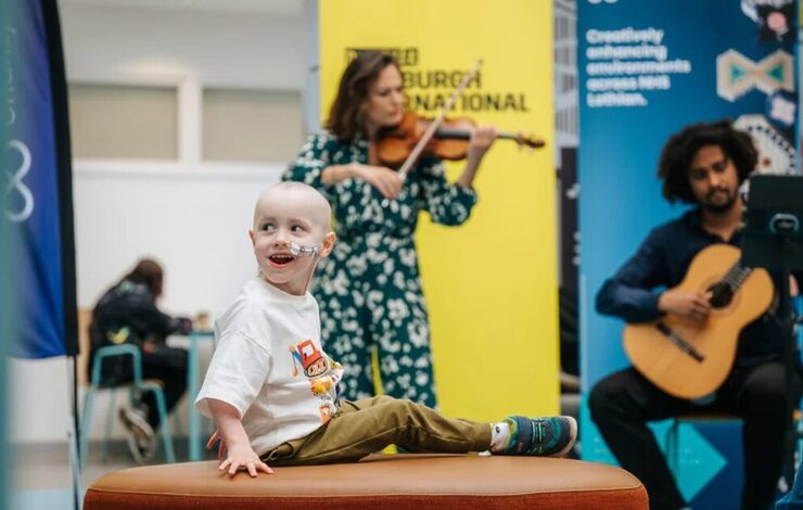 Nicola Benedetti With Child playing violin