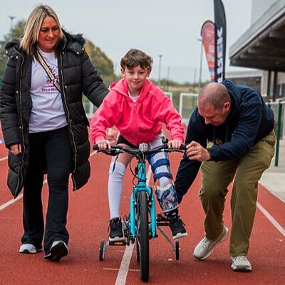 young person riding a bike