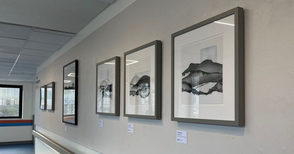 artworks along a hospital corridor