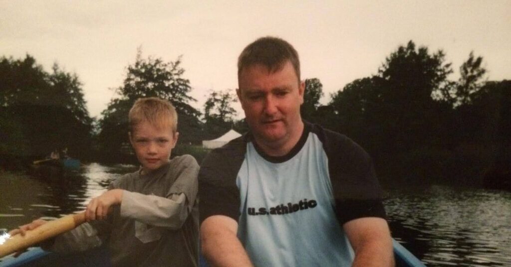 Alexander Ferguson and his dad in a boat