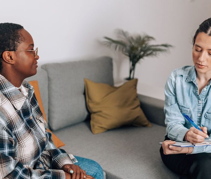 two people talking in a consultation room