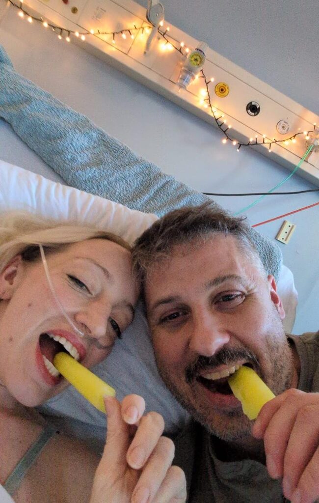 Babs and Nik eating ice lollies that were supported through NHS Lothian Charity's FACE cancer fund